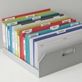 Organized file folder storage in a gray box on a white surface. The folders are arranged