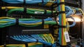 Organized network patch panel with color-coded cables Royalty Free Stock Photo