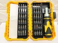 Comprehensive Screwdriver Bit Set with Handle in Yellow Storage Case Royalty Free Stock Photo