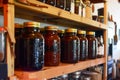 organized shelf of coffee jars in a caf Royalty Free Stock Photo