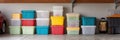 Organized Stack of Colorful Containers in Garage With Empty Left Margin Showing Clean Space Royalty Free Stock Photo