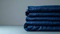 Organized Stack of Folded Blue Denim Jeans Royalty Free Stock Photo