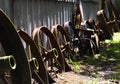 Organized vintage rusty tractor rims