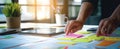 The organized workspace featuring hands arranging colorful post-it notes..AI generated image Royalty Free Stock Photo