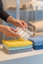 Organizing bathroom essentials in ziploc bag on soft towels for home storage solutions Royalty Free Stock Photo