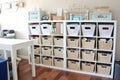 organizing and storage solutions for craft room, with bins and baskets for supplies