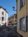 street and old houses in french town of orgelet in jura