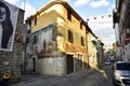 Main street in historic center of Orgosolo decorated by local artists wall paintings,