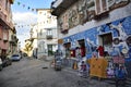 Main street in historic center of Orgosolo decorated by local artists wall paintings,