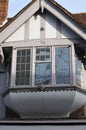 Oriel window with leaded glass at half-timbered gable Royalty Free Stock Photo