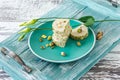 Orient pistaschio sliced halva. sweet dessert on a plate with flowers