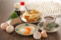 Oriental breakfast set in Malaysia consisting of coffee, nasi lemak, toast bread and half-boiled egg Royalty Free Stock Photo