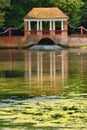 Oriental style garden with underarch cascade at Russel gardens in Kent UK