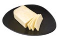 Oriental cuisine, paneer indian white unsalted cheese on dark ceramic dish, isolated on white whithout shadow