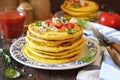Oriental cuisine. Salty flat cakes with blue cheese and tomatoes