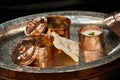 Oriental cuisine served in copper utensils. National Turkish dish. Pilaf, meat with vegetables, ayran, yogurt