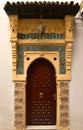 Oriental entrance door with lamp in Algiers, Africa