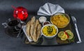 Oriental Indian set chicken korma naan bread, plate, coffee, Royalty Free Stock Photo