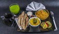 Oriental Indian set chicken korma naan bread, plate, coffee, g Royalty Free Stock Photo