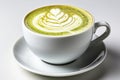 Oriental matcha latte in a cup and saucer on a white background