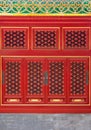 oriental pattern details on wooden door and windows in the Forbidden City Royalty Free Stock Photo