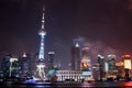 Oriental Pearl Radio and Television Tower protruding the Shanghai skyline on a warm summer night. Royalty Free Stock Photo
