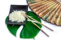 Oriental set of rice, chopsticks, green leaf and transp Royalty Free Stock Photo