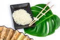 Oriental set of rice, chopsticks, green leaf and transp Royalty Free Stock Photo