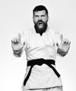 Oriental sports concept. Jiu Jitsu master with black belt Royalty Free Stock Photo