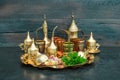 Oriental tea coffee table golden dishes delight mint Ramadan