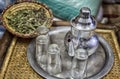 An oriental tea service with peppermint leafs Royalty Free Stock Photo
