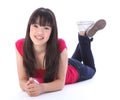 Oriental teenager high school girl lying on floor