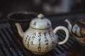 Oriental traditional teapot with characters