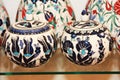 Oriental turkish traditional ceramic jugs or vases with colorful floral ornaments