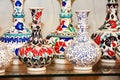 Oriental turkish traditional ceramic jugs or vases with colorful floral ornaments