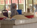 Oriental woman in a market o Bukhara in Uzbekistan.