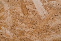 Oriented strand board texture. Natural wooden scratchy background