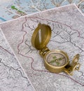 Orienteering: compass on maps Royalty Free Stock Photo