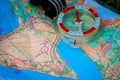 Orienteering. Compass and topographic map. Navigation equipment for orienteering. The concept