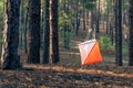 Orienteering. Control point Prism and composter for orienteering in the autumn forest. The concept. Royalty Free Stock Photo