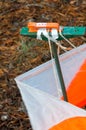 Orienteering. Control point Prism and composter for orienteering in the autumn forest. The concept. Royalty Free Stock Photo