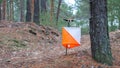 Orienteering. Control point Prism and composter for orienteering in the autumn forest. The concept