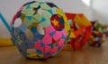 Origami ball and geometries