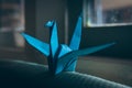 Origami Bird on a window Royalty Free Stock Photo