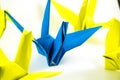 Origami birds demonstrate think different concept.