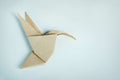 Origami brown paper hummingbird