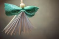 origami Christmas ball in the shape of an angel Royalty Free Stock Photo