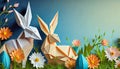 Origami Easter bunnies in grass with spring flowers - Easter concept