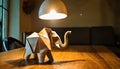 Origami elephant sitting on table