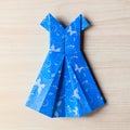 Origami made blue dress from butterfly printed paper. Mother`s day, birhday, summer gift, fashion card. Family leisure time